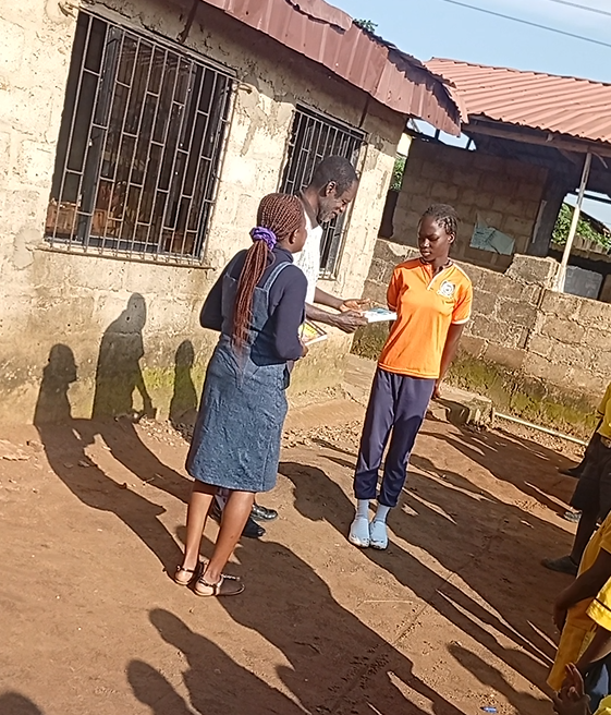 A student receiving an award during a school visit