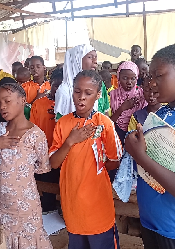 Students worshipping together
